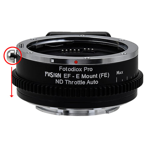 • To remove the adapter from the lens, move the release lever (circled in red) in the direction of the red arrow. While holding the release lever down, rotate the lens off the adapter: