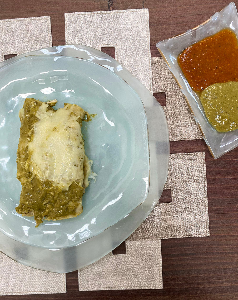 Green Chicken Enchilada on the Annieglass frosted glass dinner plates
