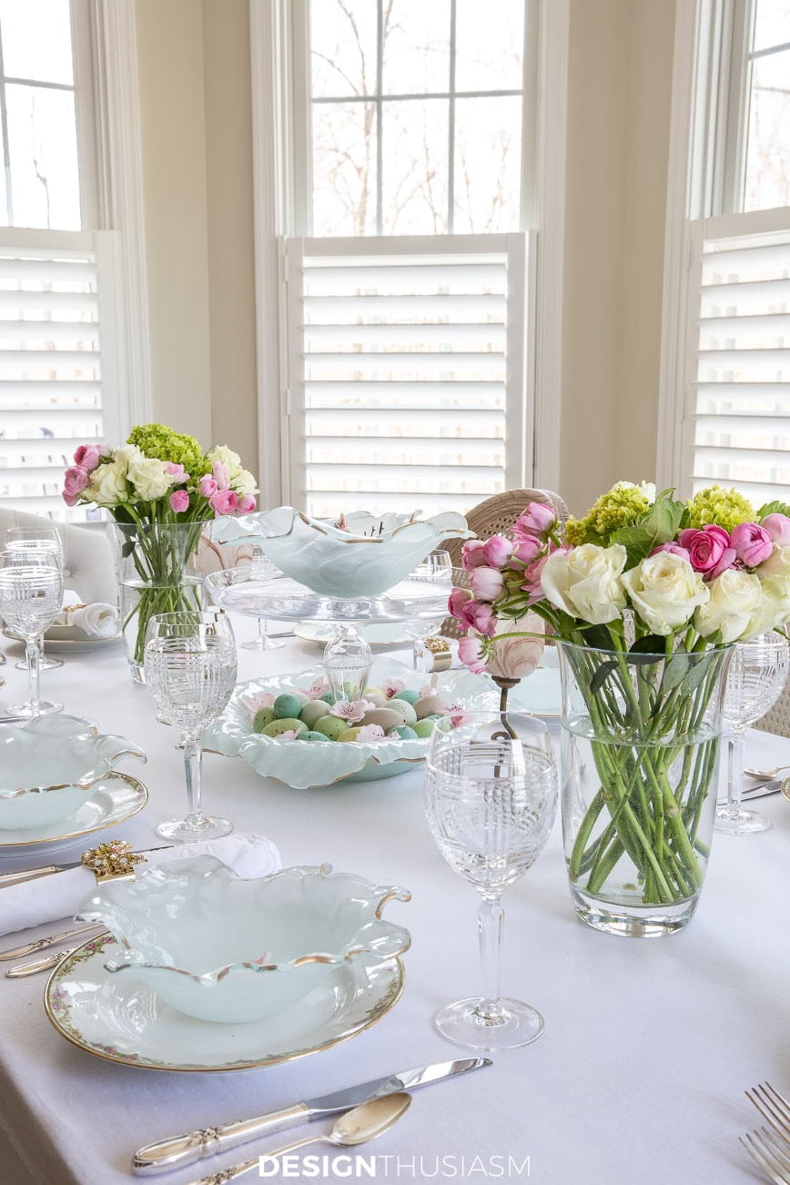 Easter table setting with Annieglass poppy bowls and spring flowers