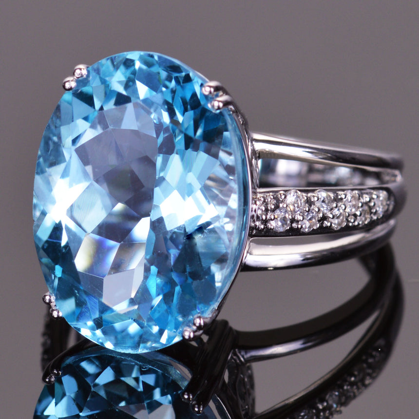 Oval Blue Topaz and White Sapphire Ring – Louis XV Jewelers
