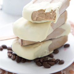 Keto Coffee Popsicles dipped in melted Sugar Free White Chocolate