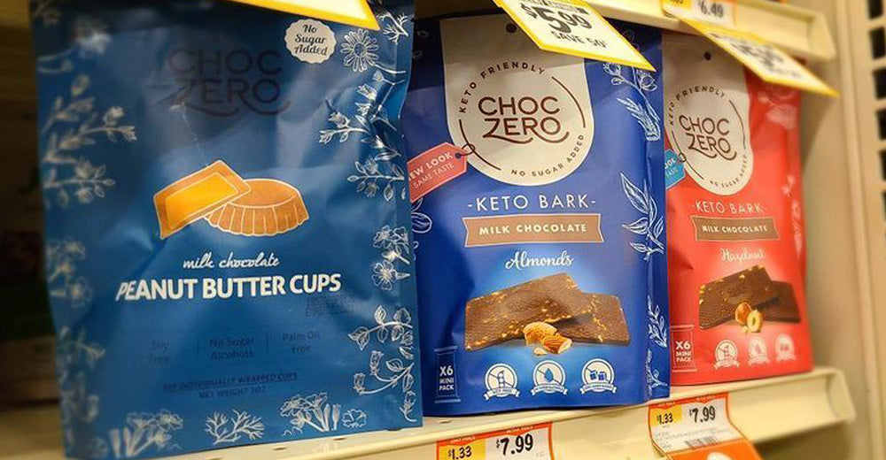 ChocZero peanut butter cups and keto bark on a store shelf