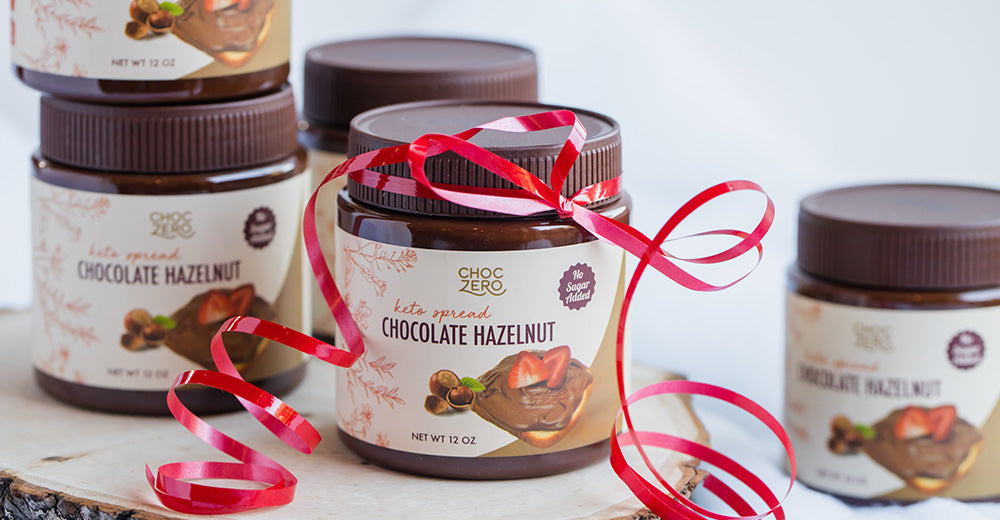 Jars of keto chocolate hazelnut spread with a ribbon