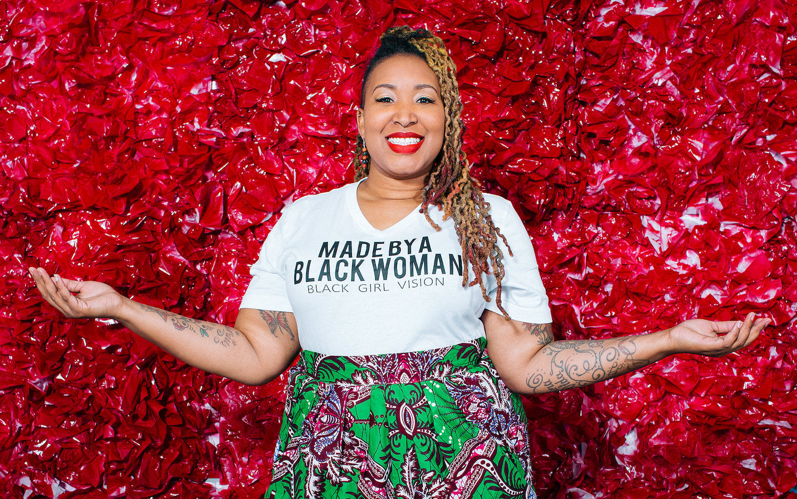 Omi Bell, founder of Black Girl Ventures with open arms