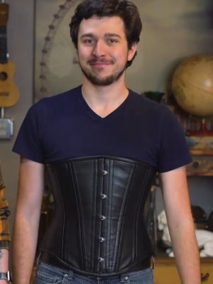 man in casual clothing with corset style number CS-701 in black leather