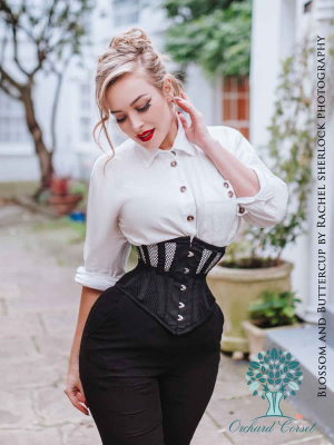 woman walking in tight-laced black mesh waspie corset style CS-201
