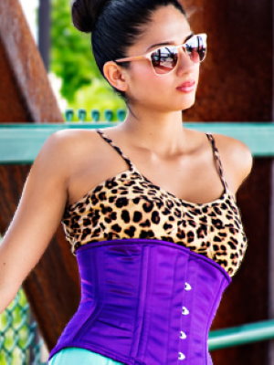 woman with purple waist trainer and leopard print tank top