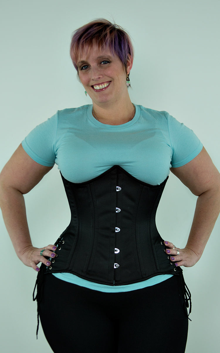 My 28 inch corset is almost closed : r/corsets