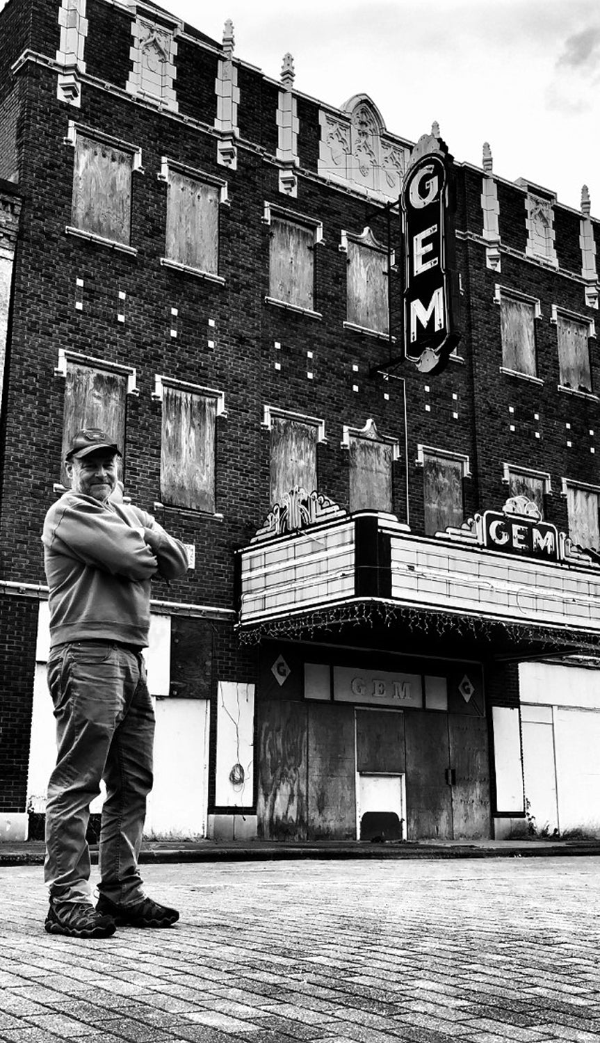 Fine art photographer Keith Dotson on the site of the old Abandoned Gem Theatre in Cairo, Illinois
