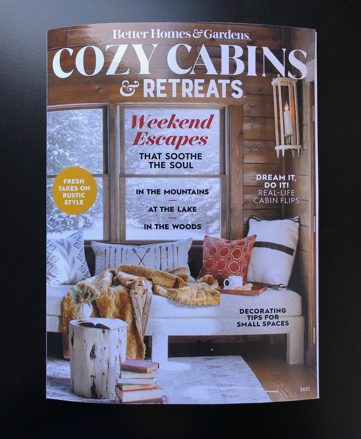 Cover of Cozy Cabins & Retreats, a special publication of Better Homes & Gardens where photographs by Keith Dotson can be seen