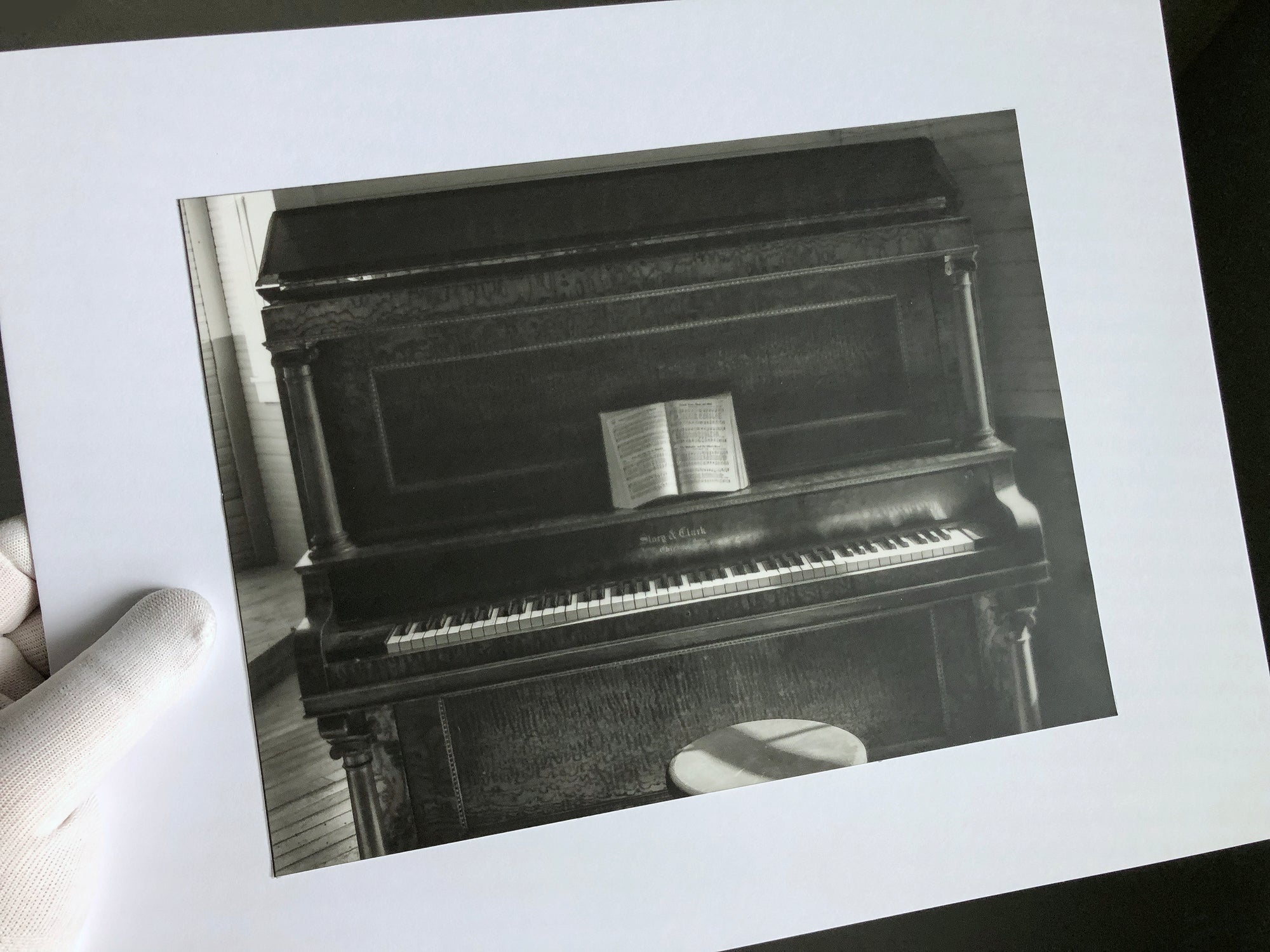 Church Piano black and white photogrpah by Keith Dotson, printed on Ilford warm tone gelatin silver fiber-based paper with a semi-matt surface..