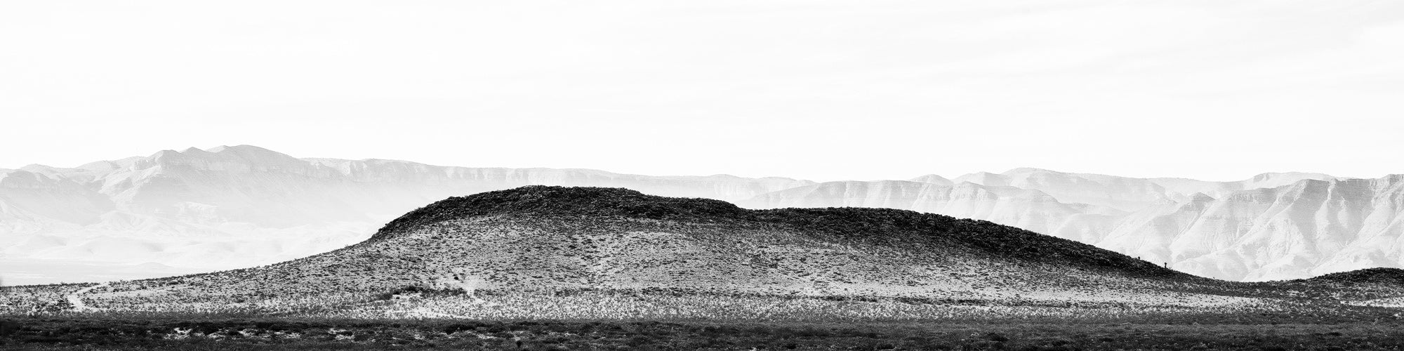 Desert Mountain Panorama: Black and White Landscape Photograph by Keith Dotson.