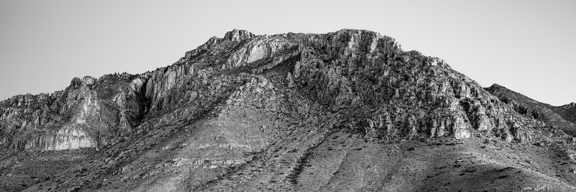 Guadalupe Mountains, a back and white panoramic photograph by Keith Dotson. 