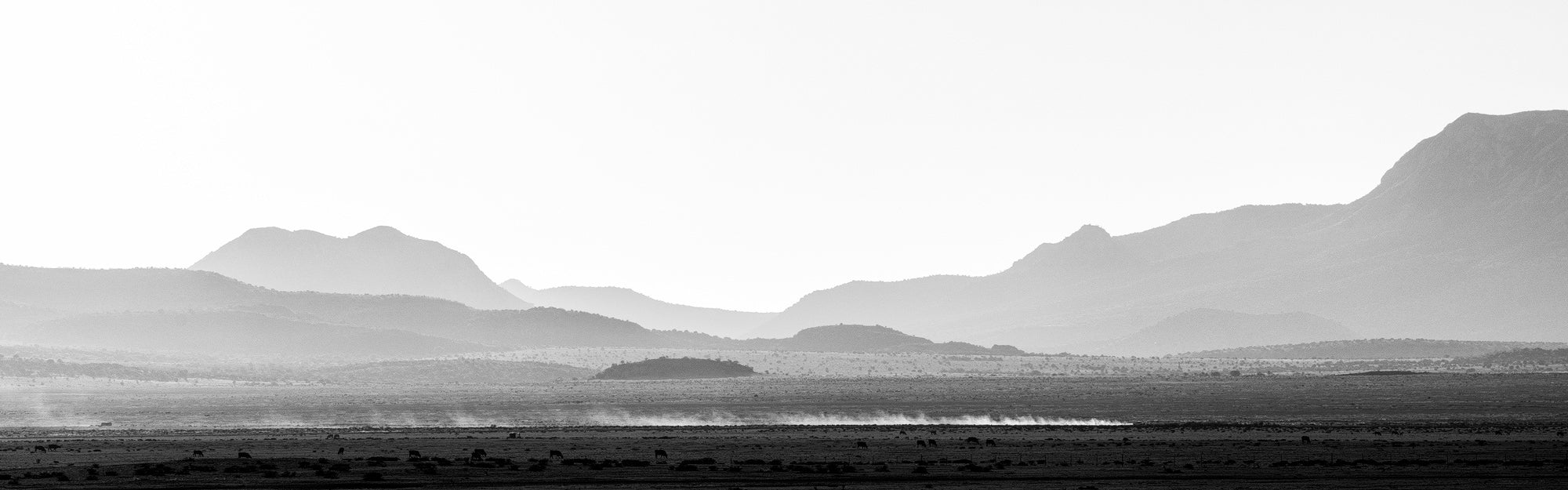 Desert Crossing: Black and White Panoramic Landscape Photograph by Keith Dotson. Buy a fine art print here.