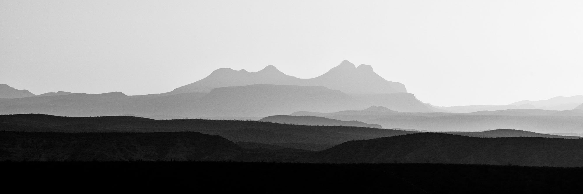 Hazy Mountain Sunrise Panorama: Black and White Landscape Photograph by Keith Dotson.