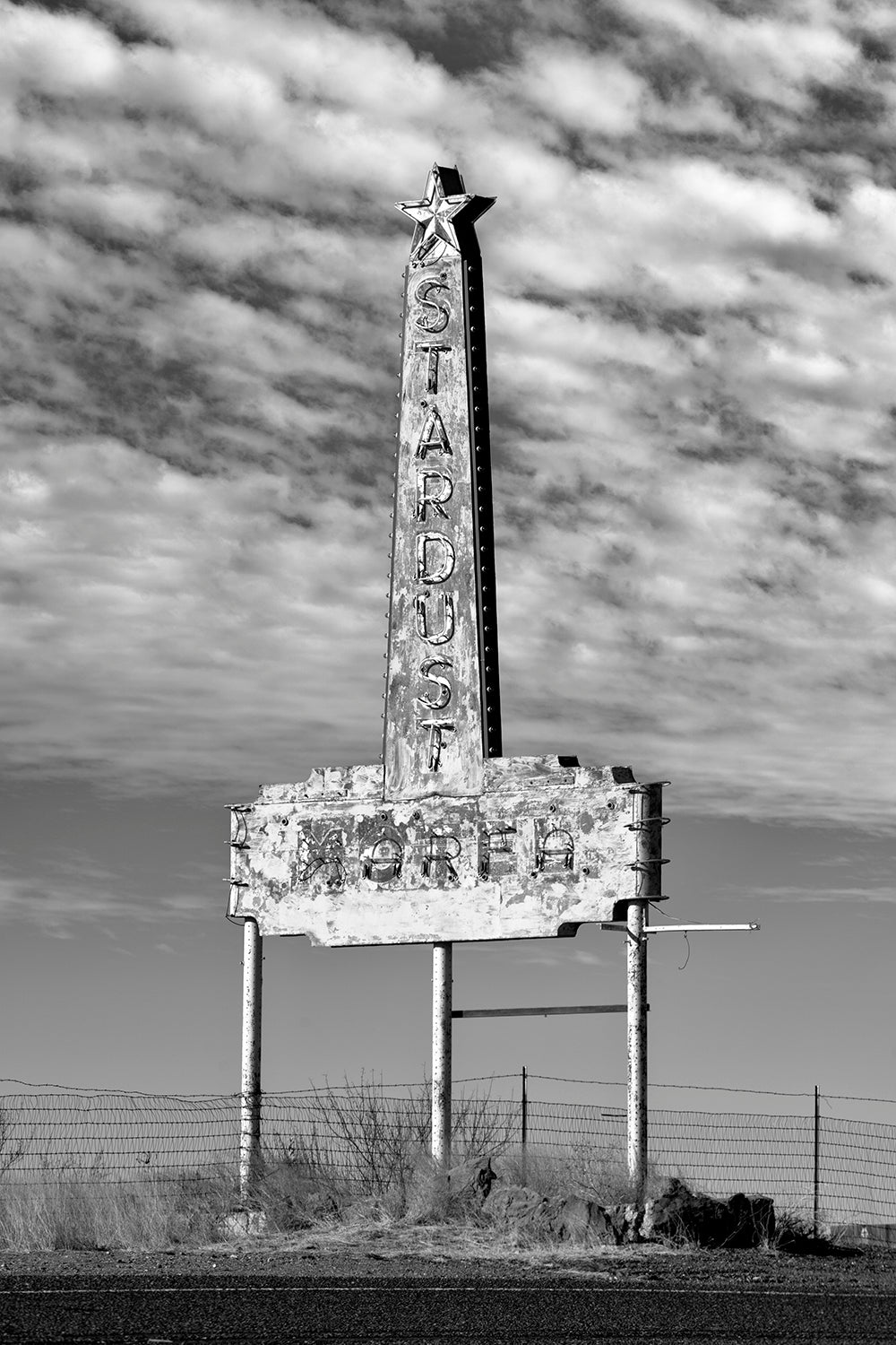Old Stardust Motel Sign in Marfa, Texas: Black and White Photograph by Keith Dotson. Buy a fine art print.