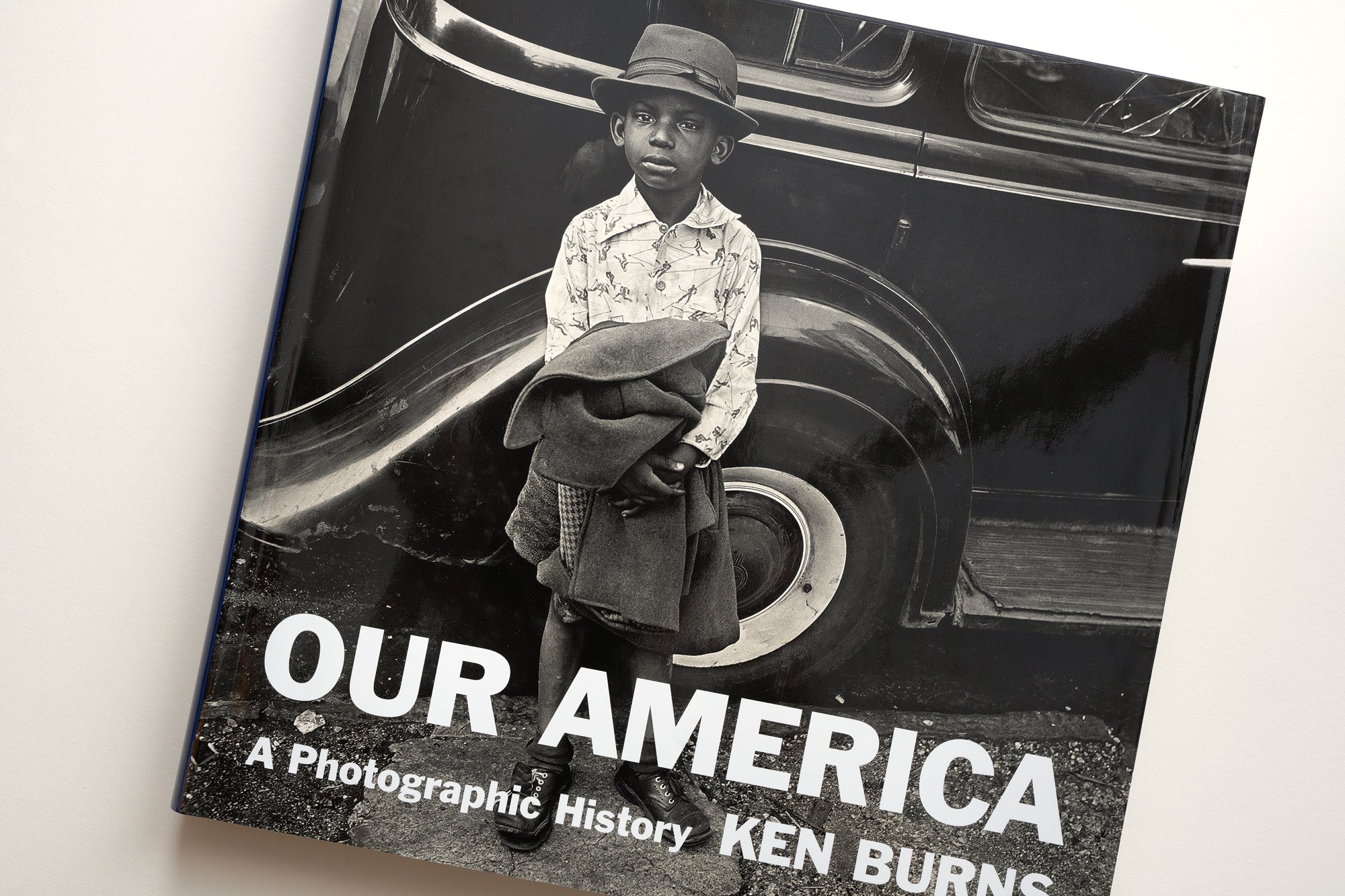 The cover of "Our America: A Photographic History" by Ken Burns features a photograph made by one of Burns' former teachers.