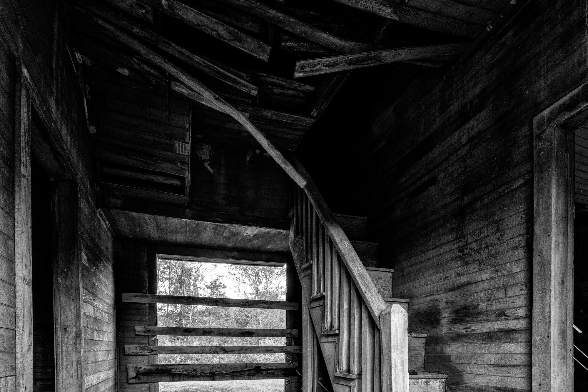 Interior of a Ruined 1890s Farmhouse - Black and White Photograph by Keith Dotson