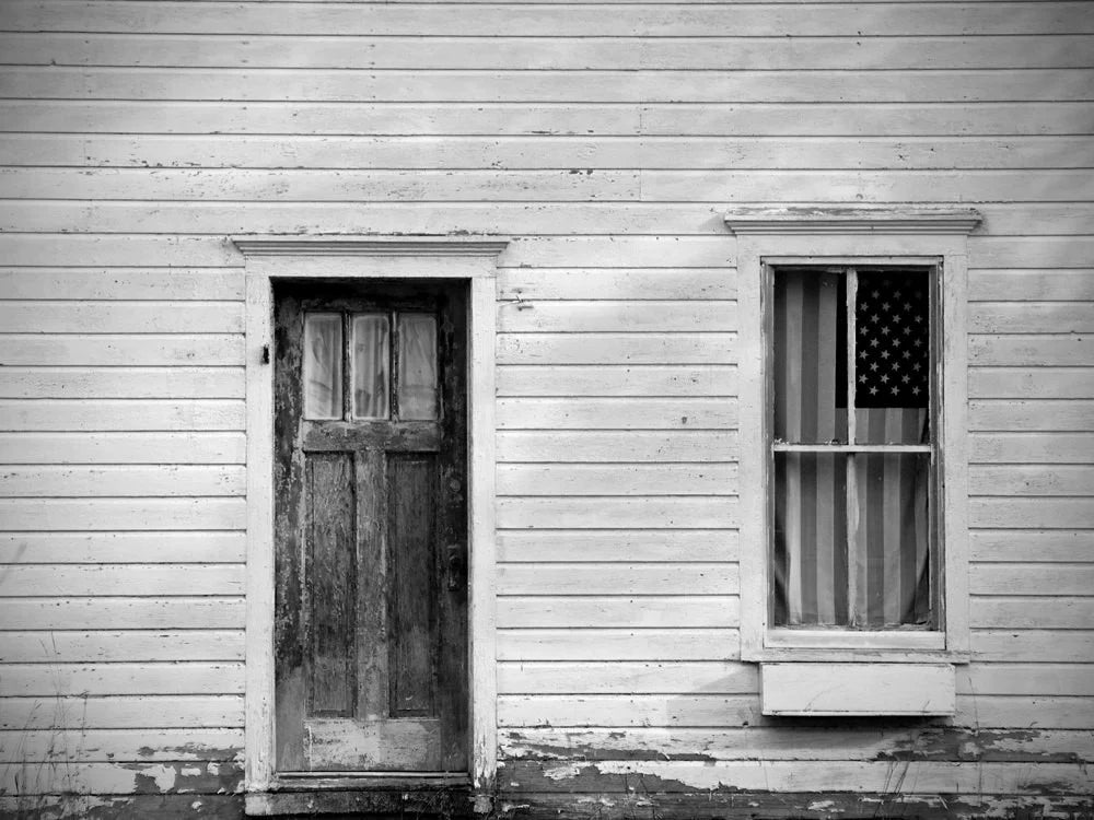 Old House with American Flag by Keith Dotson.