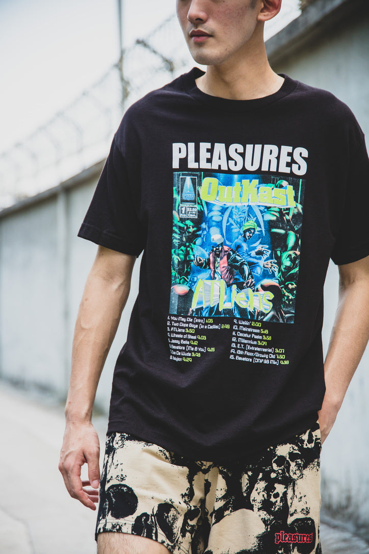 PLEASURES spring-summer 2022 model wearing ATLiens T-Shirt from Outkast Collaboration