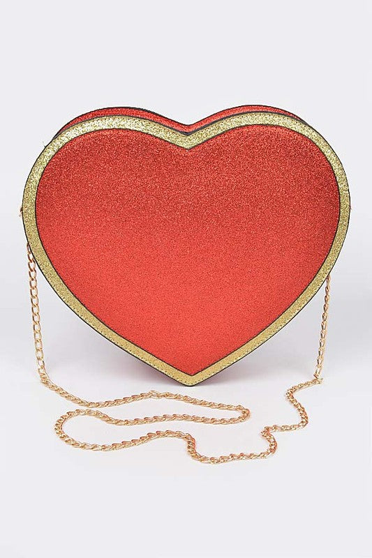 Red Heart Shaped Purse with Gold Trim and a Gold Chain Crossbody Strap