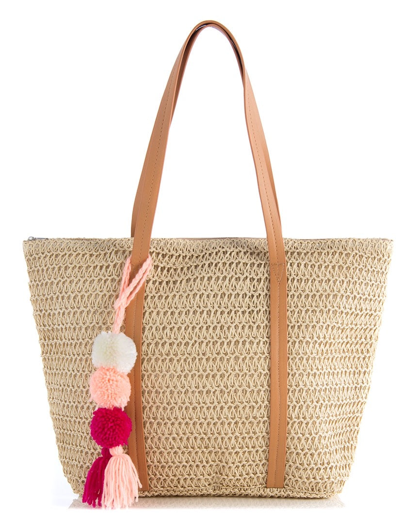 wicker beach bag with pom pom