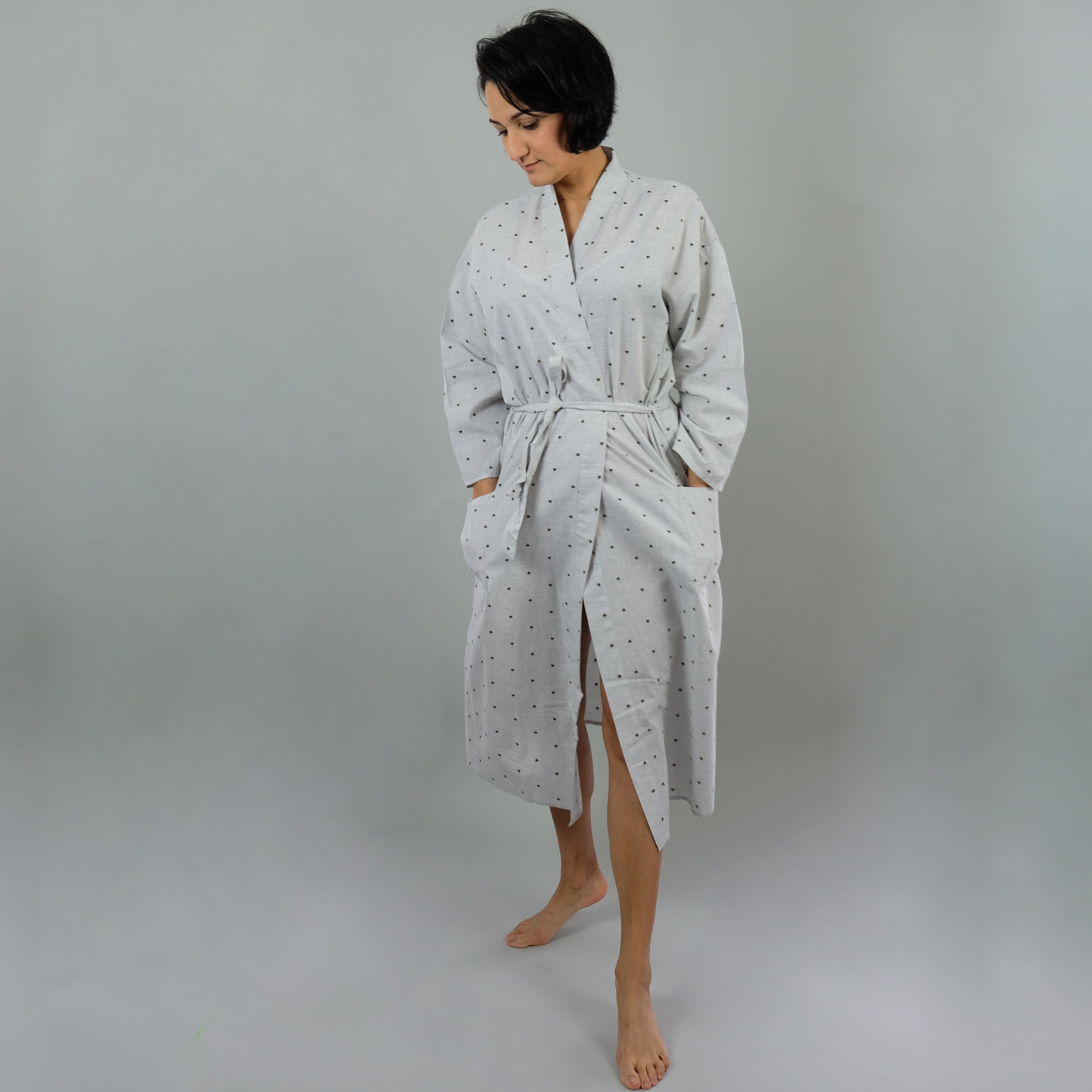 Cute woman in dressing gown Stock Photo by ©Tverdohlib.com 82189390