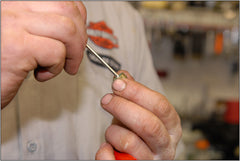 Lubricating a valve spring before installation