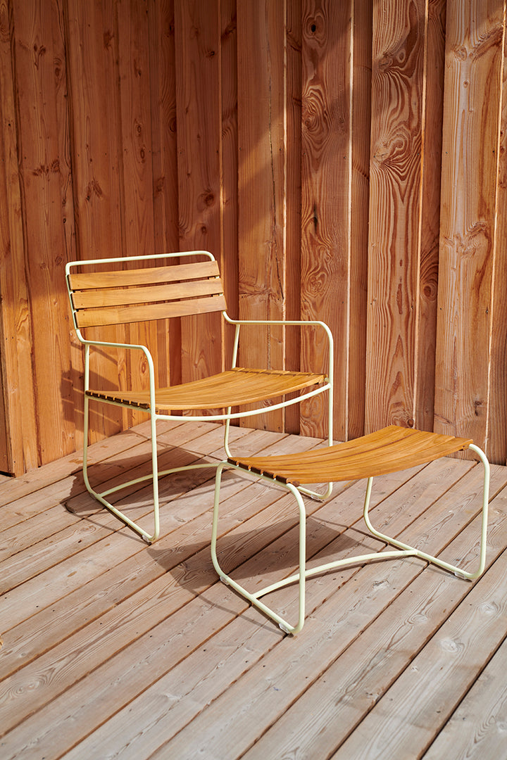 Fermob Surprising Teak Footrest with Surprising Teak Low Armchair on deck