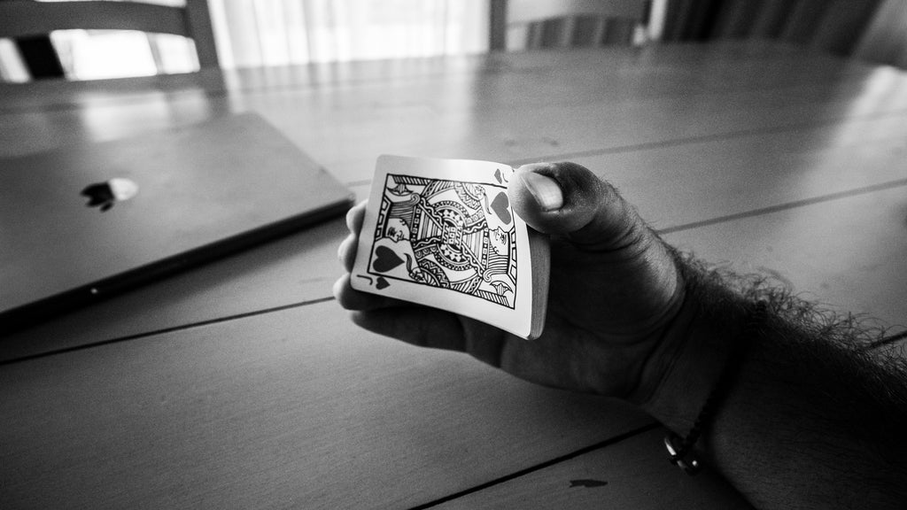 A deck of card gripped ready to spring