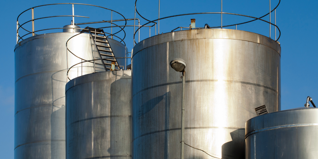 Picture of  4 massive stainless steel water tanks.