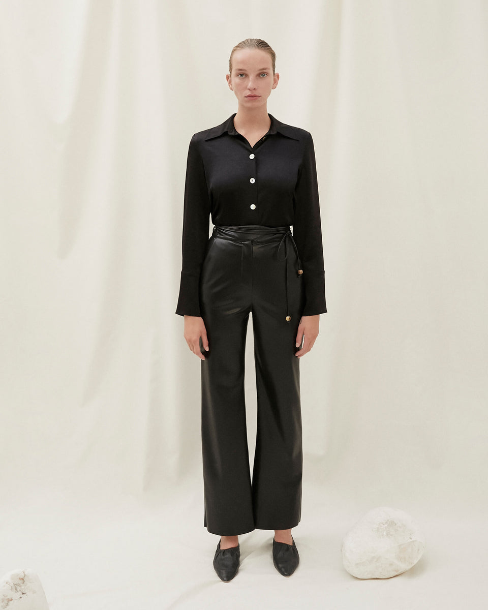 Nanushka CHIMO - Vegan leather belted pants - Black