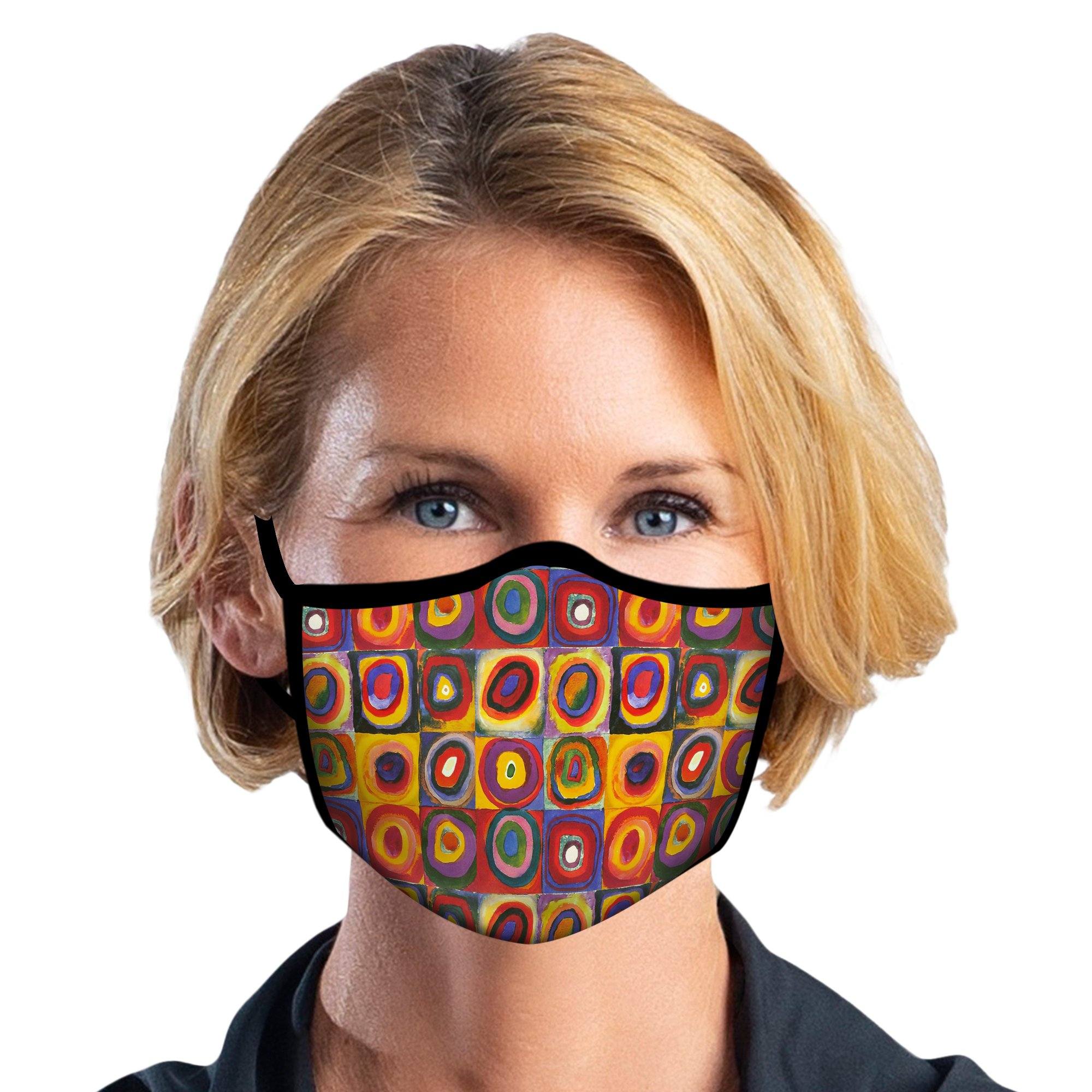 Woman wearing a RainCaper Kandinsky Circles Reusable Fabric Face Mask.
