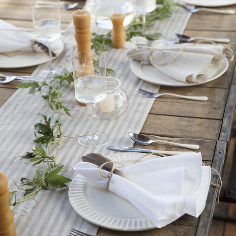 table setting with green leaves