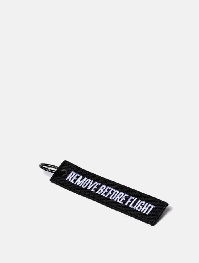 REMOVE BEFORE FLIGHT Strap - with spout carabiner