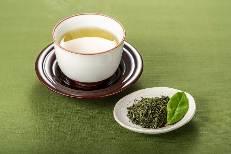 japanese green tea in green background