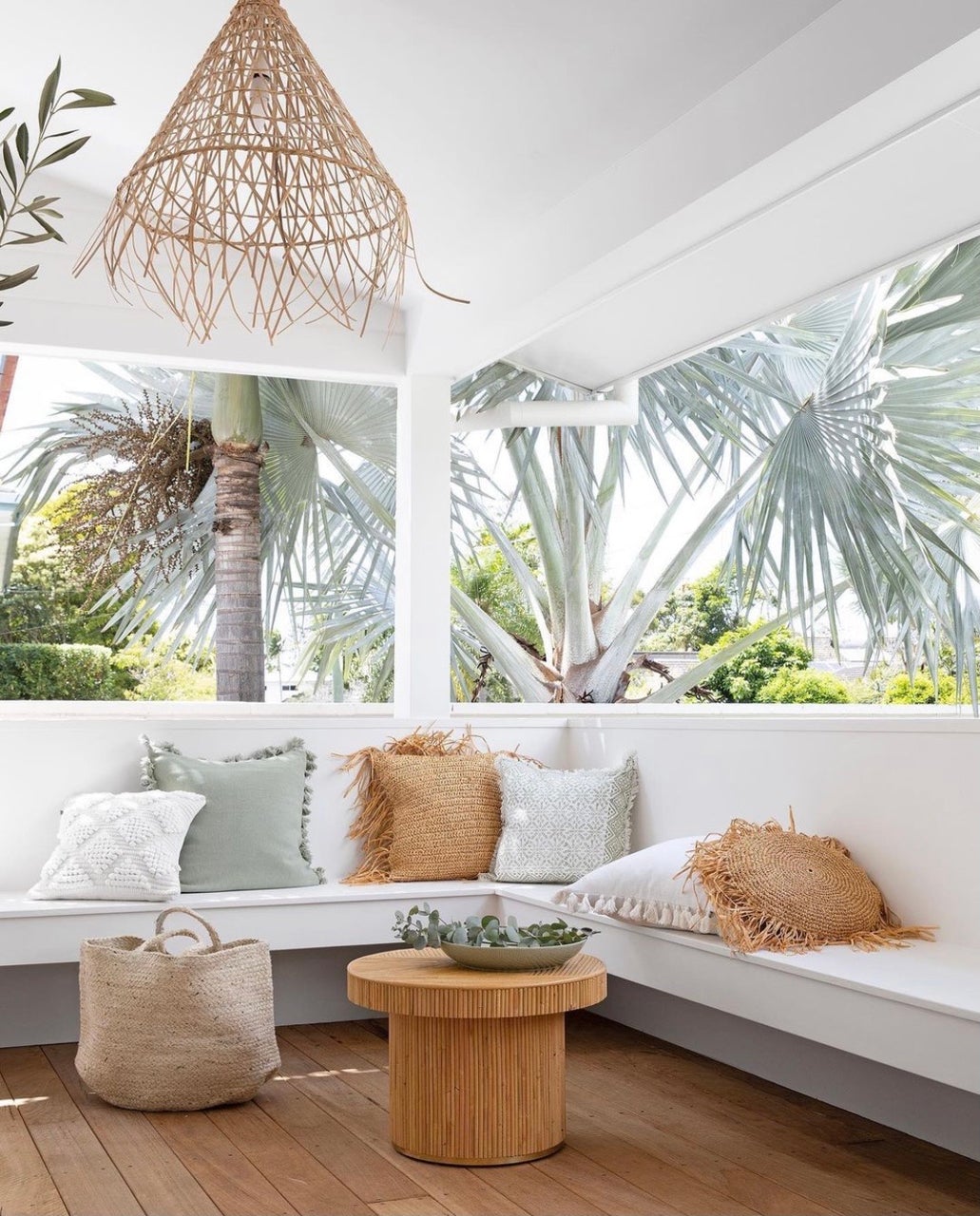 sage green cushions outdoors by sea tribe australia