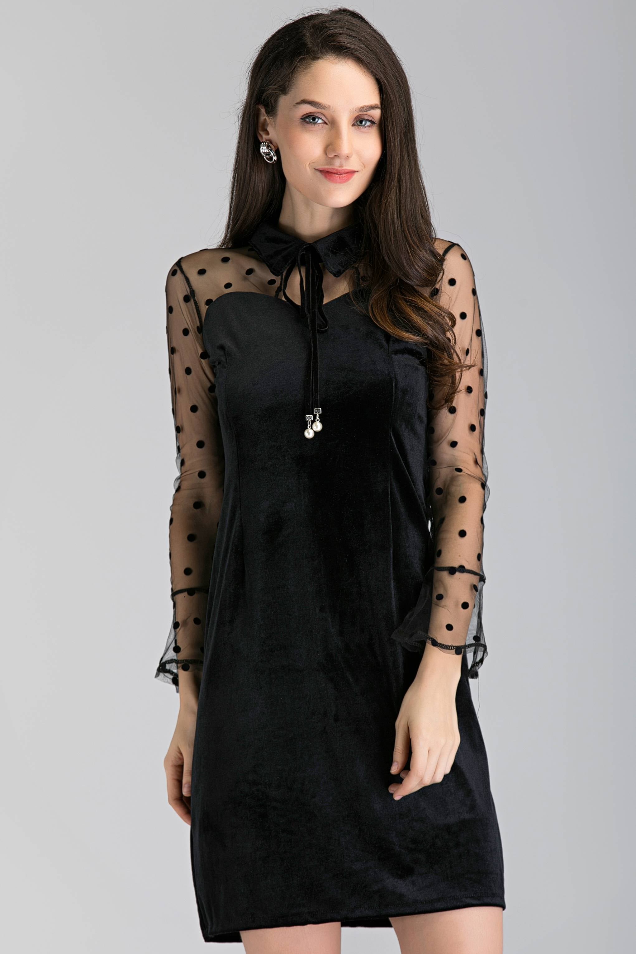 black dress with sheer polka dot sleeve