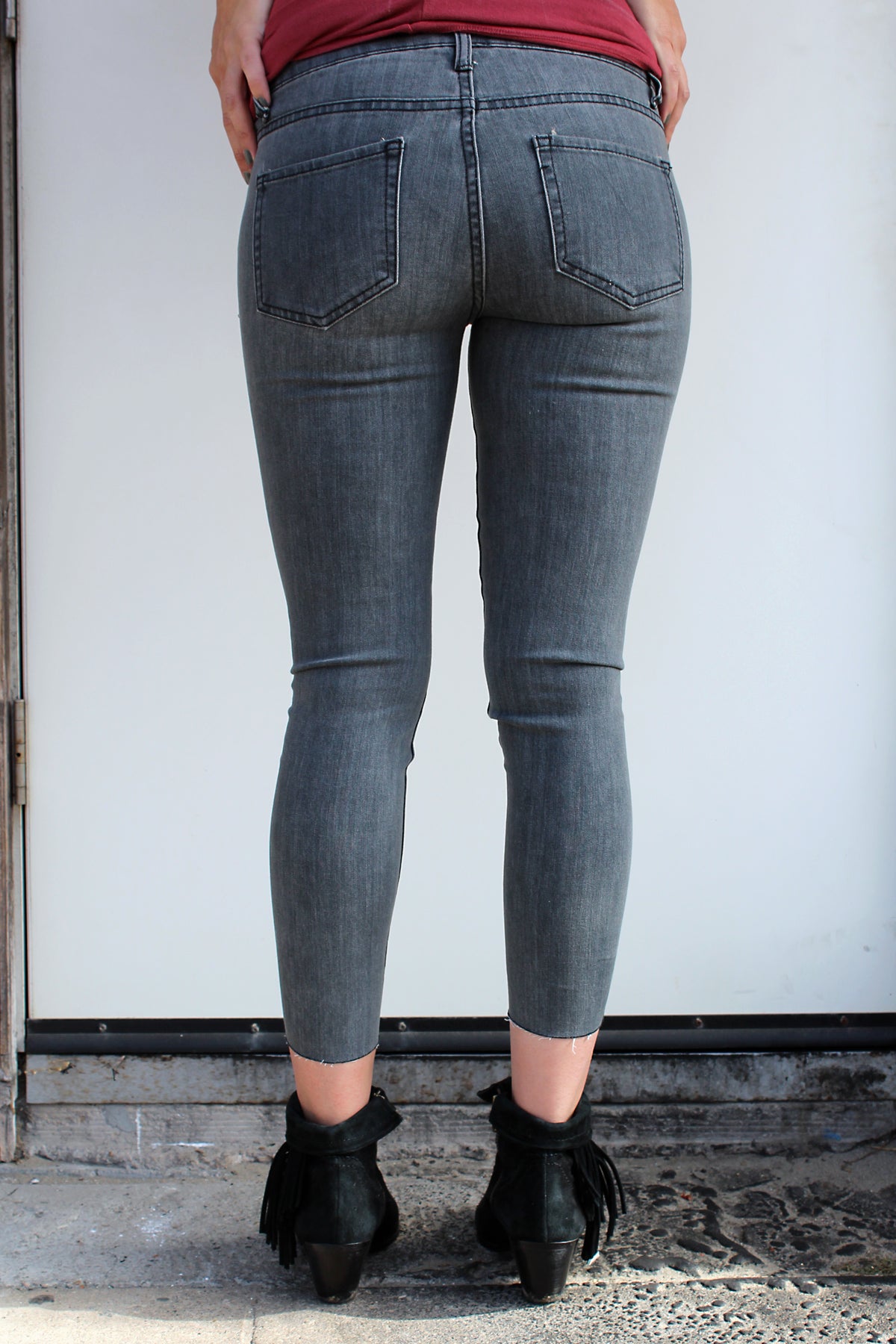 grey distressed jeans