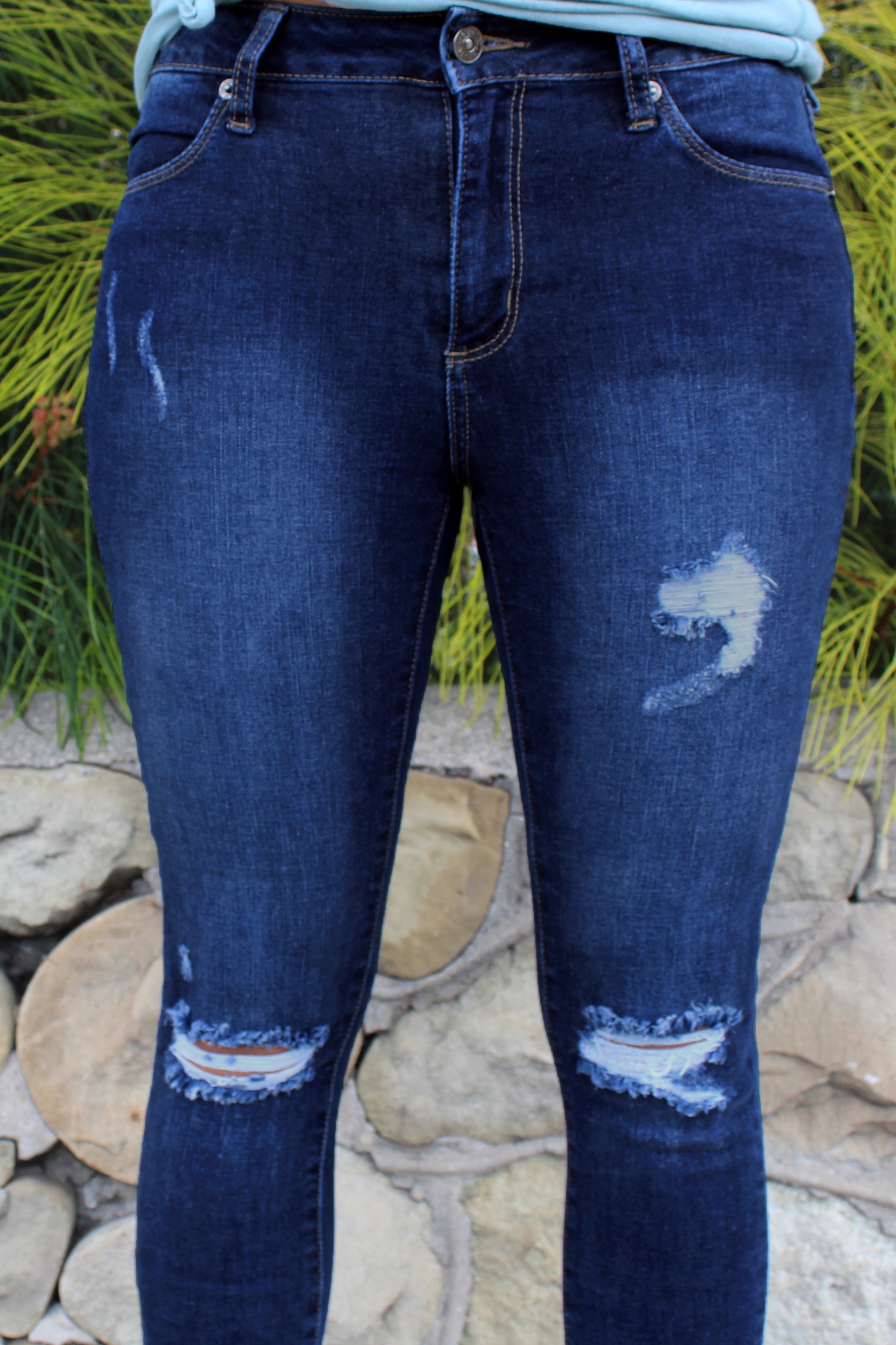 dark wash destroyed skinny jeans