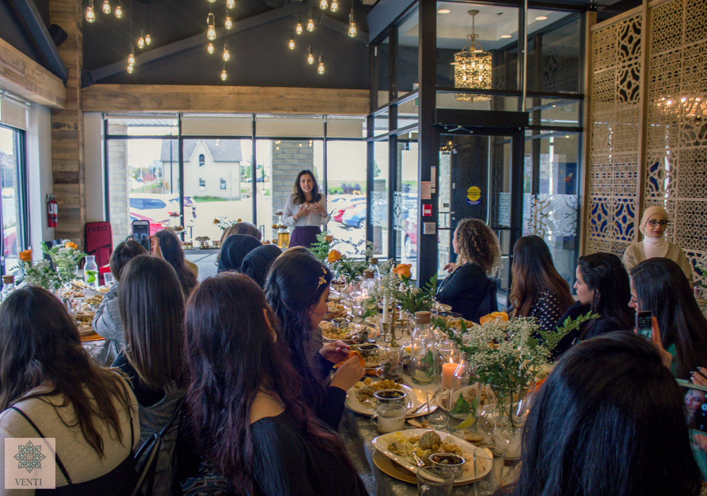 Noora Sharrab Sitti Soap co-founder speaking to a room full of women on entrepreneur and global conscious consumerism venti special events mississauga motivational speaker