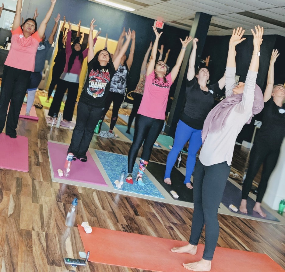 Yoga Session with Women Fundraising Sakeena Homes Work Around Workspace Toronto