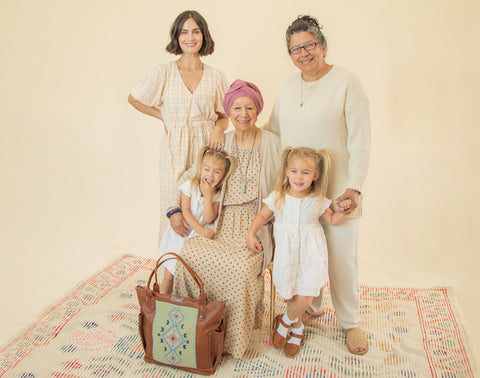4 generation photo with great grandma, grandma, daughter, and twin grand daughters