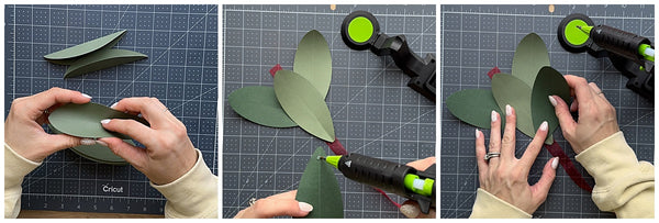 Gluing leaves to ribbon for Valentine's Day Candy Hearts and Leaves Garland