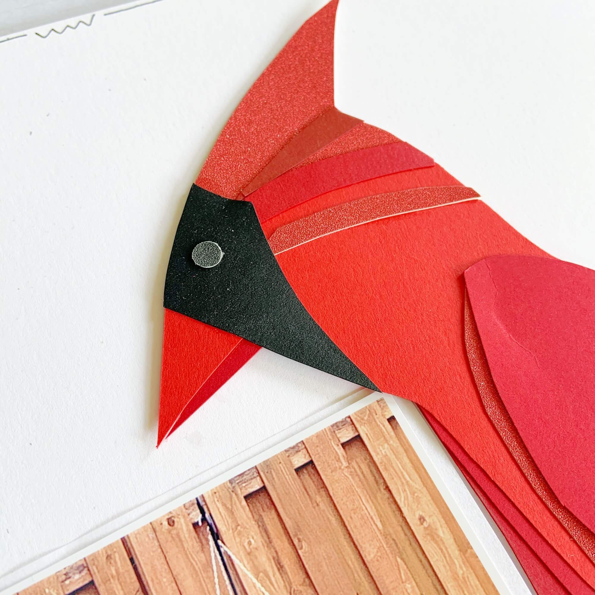 Red paper cardinal head