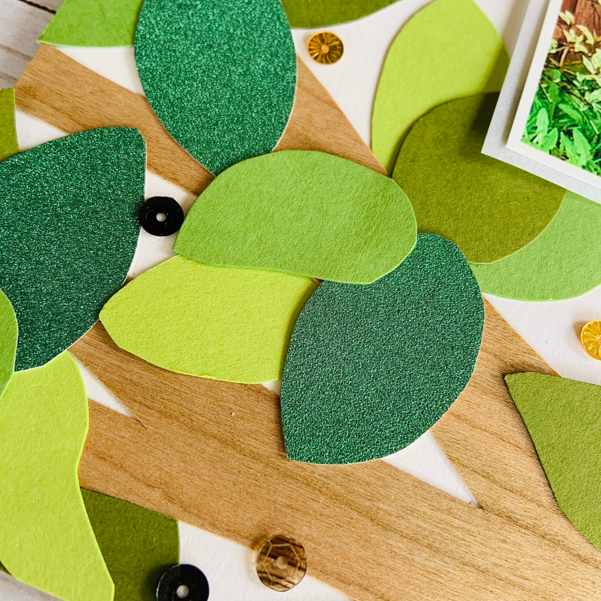 hand cut leaves on wood veneer branch