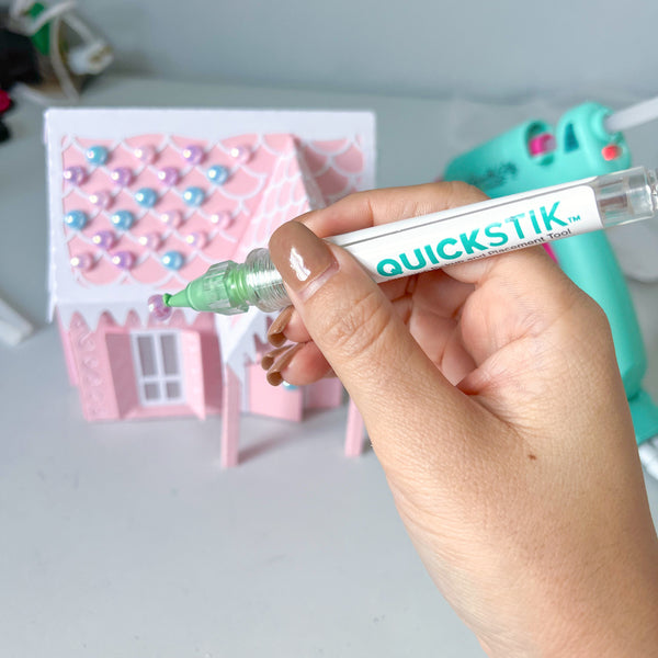 using quickstick to add pearls to roof of 3d paper gingerbread house