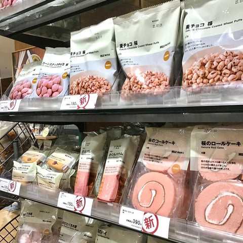 Exploring Sakura Cuisine Beyond Traditional Cuisine, a shelf full of sakura-flavored Muji products in Japan.