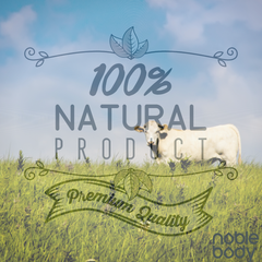 A white cow in a pasture. Caption reads "100% natural product."