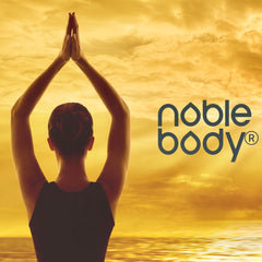 Woman posing and looking at yellow/orange sky. Caption reads "Noble Body."